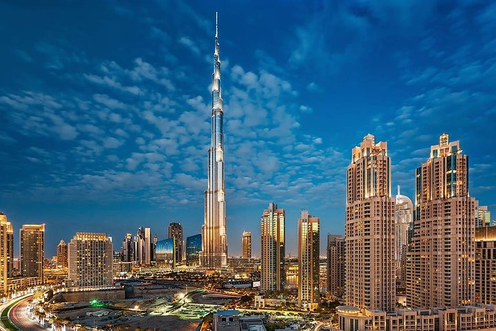 Experience breathtaking views from Level 148 of Burj Khalifa featuring an outdoor terrace refreshments at the sky lounge and personalized hotel transport all in the heart of Dubai.